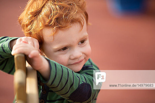 Portrait of boy with red hair