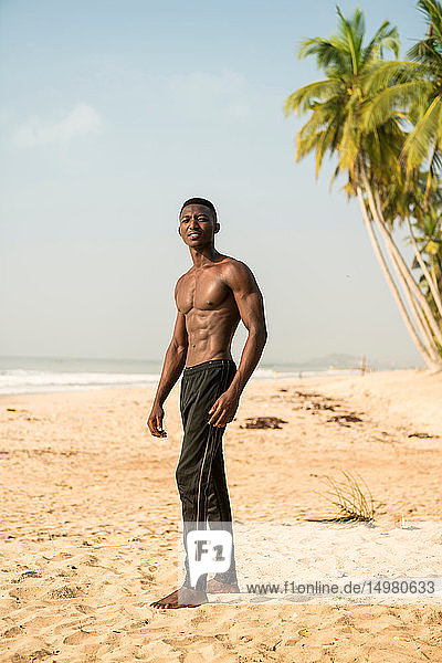 Muscular man on beach
