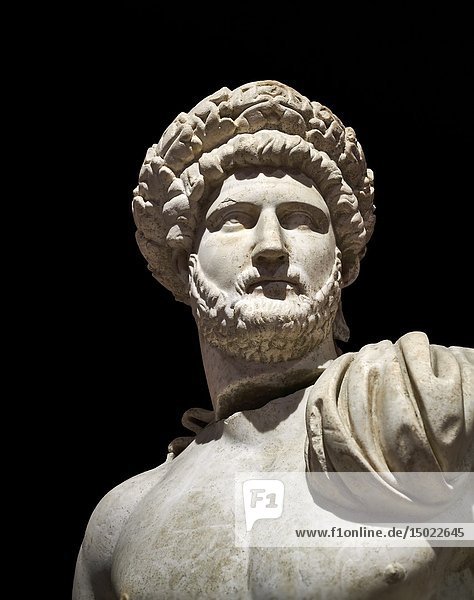 Roman statue of Emperor Hadrian. Marble. Perge. 2nd century AD. Inv no 3861-3863. Antalya Archaeology Museum  Turkey. Against a black background.