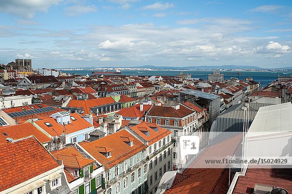 Lisbon  Portugal  Europe - An elevated view of the historic city district Baixa with the Tagus River in the backdrop.