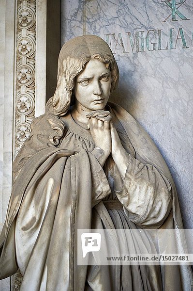 Picture and image of the stone sculpture of a young women grieving in the Borgosie Realistic style. The Gatti Tomb sculpted by G Benetti 1875. Section D no 5  the monumental tombs of the Staglieno Monumental Cemetery  Genoa  Italy.