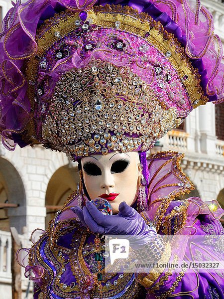 Woman in mask  Carnival at St Marks s Square  Venice  Italy.