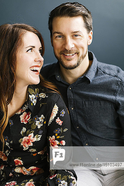 Smiling mid adult couple