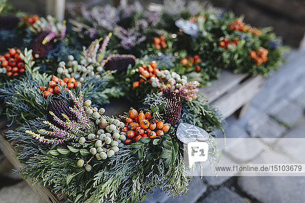 Christmas wreaths on pallet