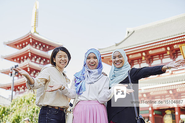 Young South-east Asian women enjoying sightseeing in Tokyo