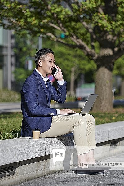 Young Japanese businessman downtown Tokyo