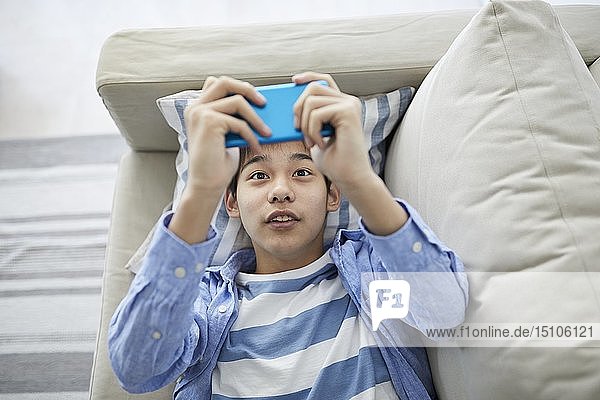 Japanese teenager with smartphone
