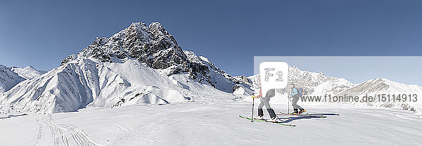 Georgia  Caucasus  Gudauri  two people on a ski tour