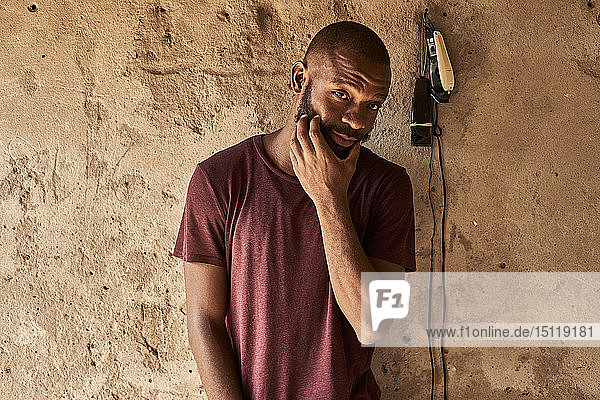 Mosambik  Maputo  Porträt eines bärtigen jungen Mannes