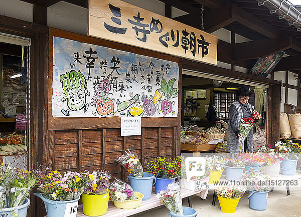 A shop selling fruit vegetables and flowers in Hida Furukawa Gifu Prefecture Honshu Japan Asia