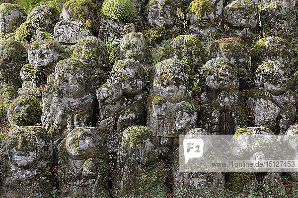 A collection of 1200 Rakan statues representing the disciples of Buddha  Otagi Nenbutsu-ji temple  on the outskirts of Kyoto  Japan  Asia