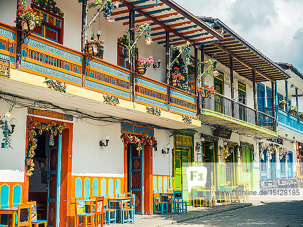 Colorful houses line the Parque Principal  Jardin  Antioquia  Colombia  South America