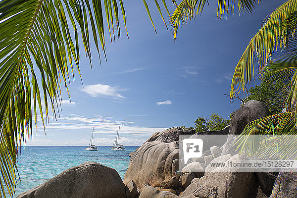 Distinctive limestone rock formations at Anse Lazio on Baie Chevalier Praslin Seychelles Indian Ocean Africa