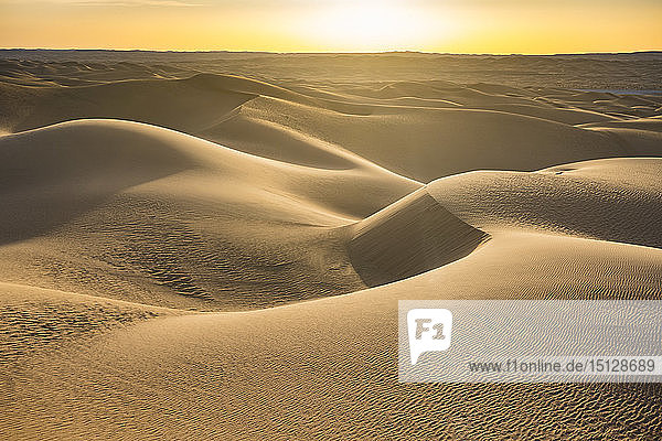 Sunset in the giant sand dunes of the Sahara Desert Timimoun western Algeria North Africa Africa