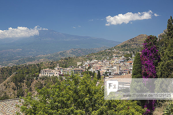 View over the town from the Greek Theatre  Mount Etna in background  Taormina  Messina  Sicily  Italy  Mediterranean  Europe