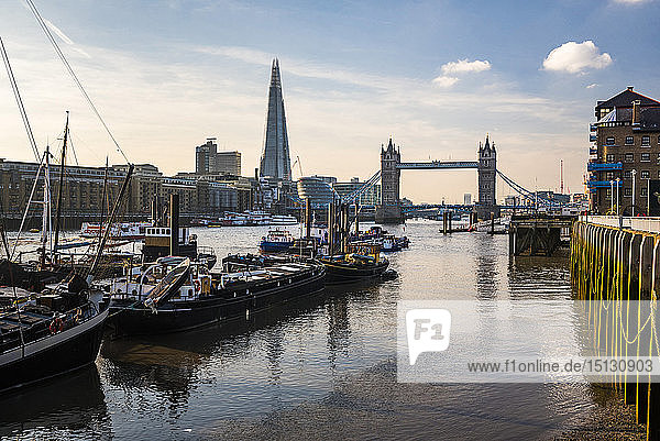 Tower Bridge and The Shard at sunset  seen behind the River Thames  Tower Hamlets  London  England  United Kingdom  Europe
