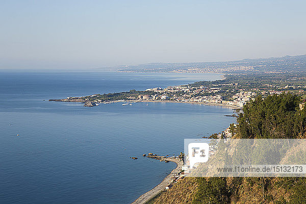 View from Piazza IX Aprile over the Bay of Naxos to distant Giardini-Naxos  early morning  Taormina  Messina  Sicily  Italy  Mediterranean  Europe