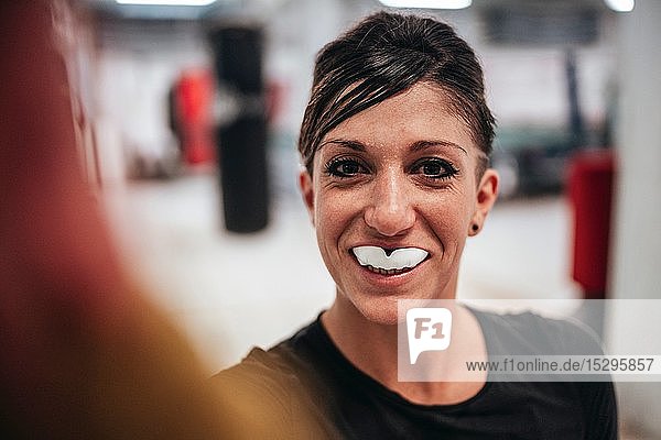 Boxer wearing gumshield in gym