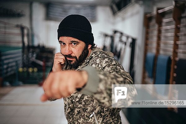 Boxer training in gym
