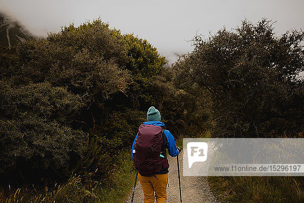 Hiker walking on trail path  Wanaka  Taranaki  New Zealand