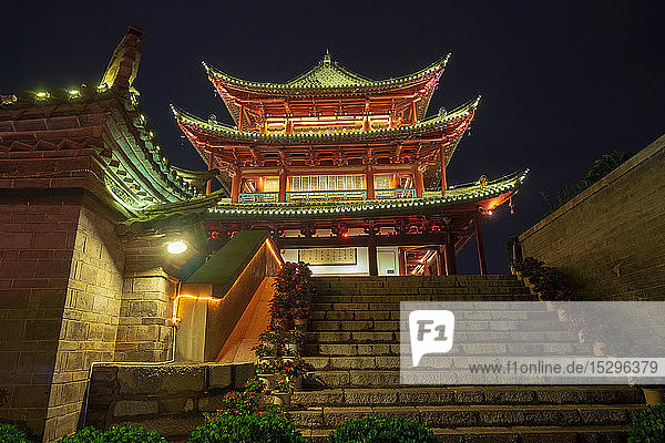 Old city gate  stairway and temple at night  Jianshu County  Hunan Province  China