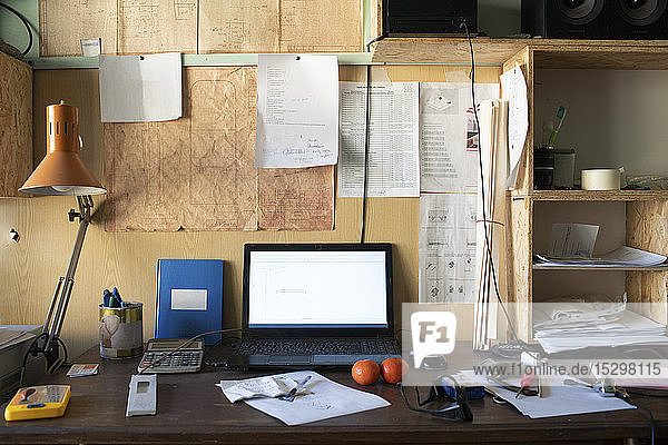 Carpentry workshop  desk with laptop