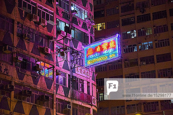 Lighted neon sign of a hotel at night Kowloon Hong Kong China