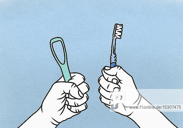 Fäuste halten Zahnbürste und Zungenreiniger