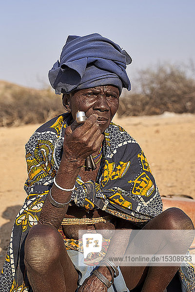 Old Mucubal tribe woman smoking her pipe  Mucubal tribe  Tchitundo Hulo  Angola
