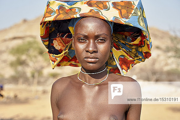 Young Mucubal woman with her traditional headscarf  Mucubal tribe  Tchitundo Hulo  Virei  Angola