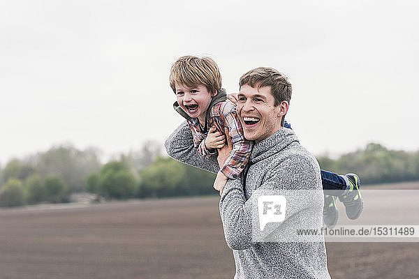 Father and son having fun  outdoors