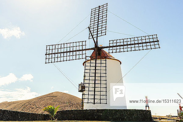 Man next to old windmill Lanzarote Canary Islands Spain