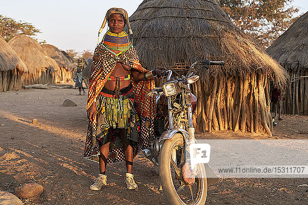 Proud Muhila woman and her bike  Kehamba  Chibia  Angola
