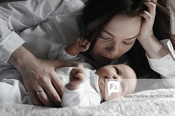 Close-up of woman with her baby son