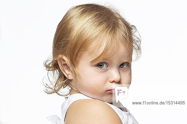 Portrait of pouting blond girl  white background