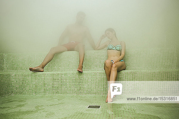 Couple relaxing in a hammam