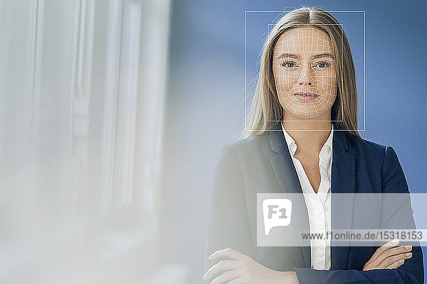 Facial recognition  businesswoman with grid over her face