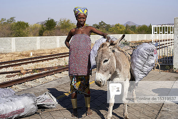 Ndengelengo woman and her donkey  Garganta  Angola.