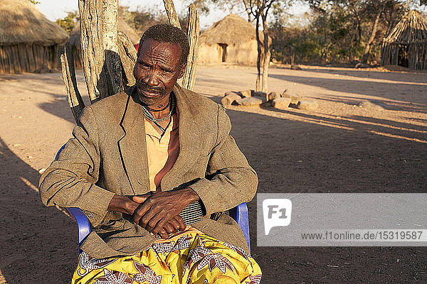 Soba of the Muhila tribe sitting on his chair  Kehamba  Chibia  Angola