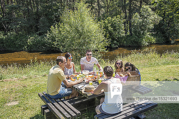 Auvergne - Rhone-Alpes - Haute-Loire - Saint-Julien-d'Ance - Family picnic on the bank of the Ance river.