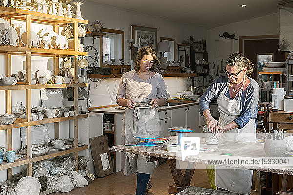 Women in pottery workshop