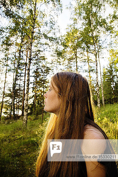 Young woman in forest