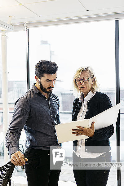 Businesspeople with folder