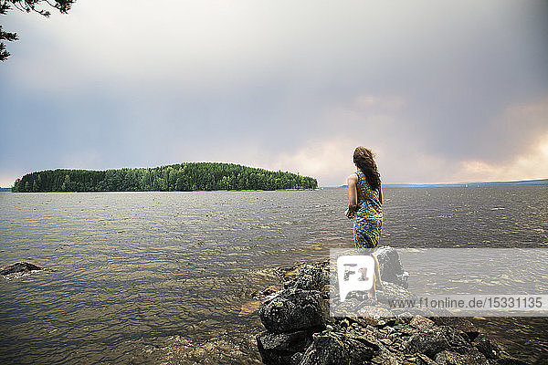 View of woman standing and looking at view