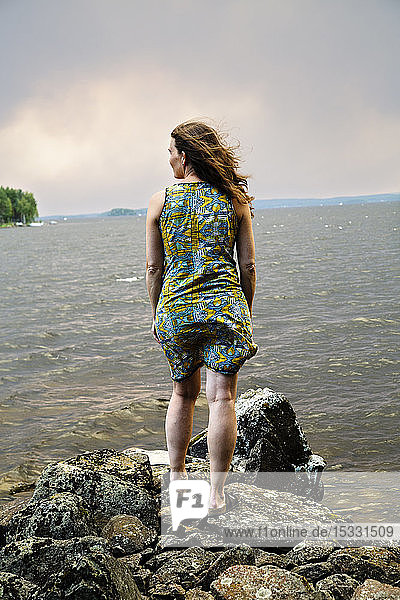 View of woman standing and looking at view