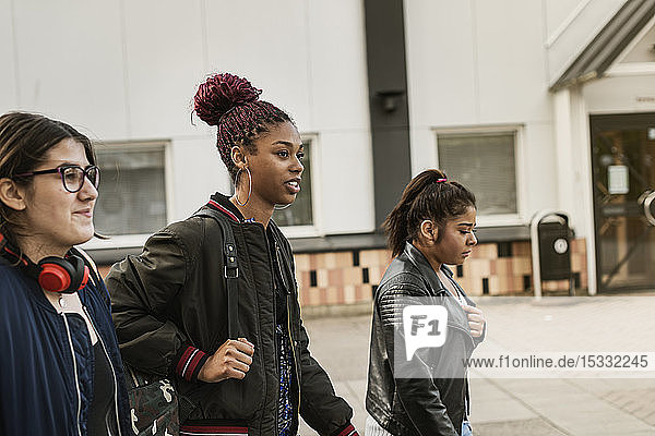 Teenage girls on footpath
