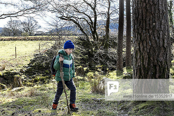 Boy exploring national park Llanaber Gwynedd United Kingdom