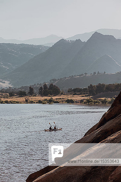 Friends kayaking in lake Kaweah California United States
