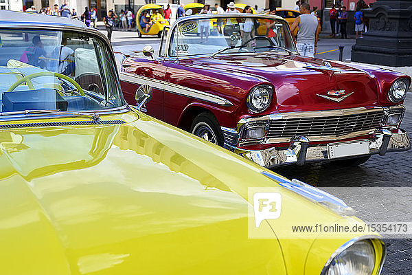 Vintage cars parked; Havana  Cuba