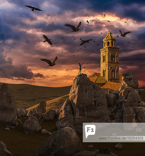 Crows flying towards a church tower with a wooden human mannequin laying on the ground in the foreground